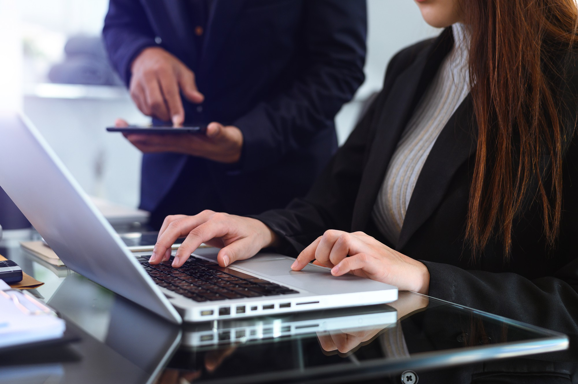 Business professional working on laptop